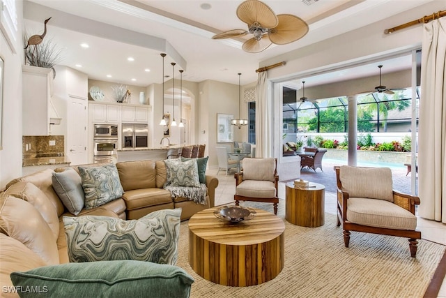 living area with light tile patterned floors, recessed lighting, and ceiling fan