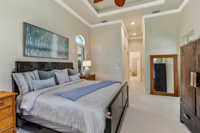 bedroom featuring visible vents, crown molding, carpet, recessed lighting, and a raised ceiling