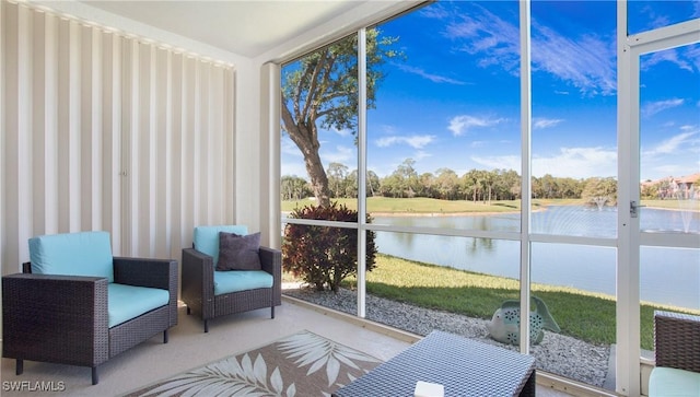 5705 Heron Ln Unit 801, Naples, FL 34110 - sunroom / solarium with a water view