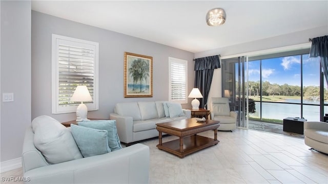 5705 Heron Ln Unit 801, Naples, FL 34110 - living room featuring plenty of natural light