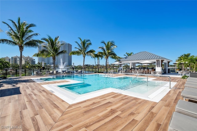 13945 Old Coast Rd Unit 302, Naples, FL 34110 - community pool featuring a gazebo and fence