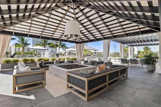 13945 Old Coast Rd Unit 302, Naples, FL 34110 - view of patio with an outdoor living space, a gazebo, and a pergola