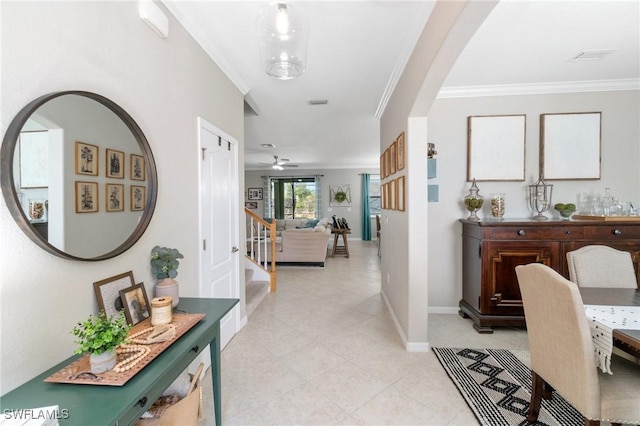 13570 San Georgio Dr, Estero, FL 33928 - corridor with baseboards, crown molding, arched walkways, and stairway