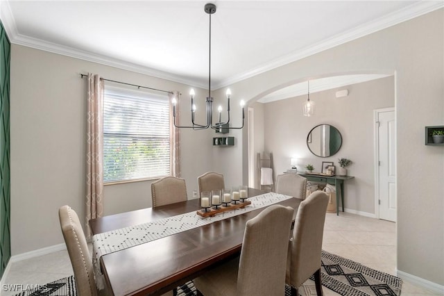 13570 San Georgio Dr, Estero, FL 33928 - dining space featuring crown molding, light tile patterned floors, baseboards, arched walkways, and a notable chandelier