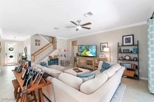 13570 San Georgio Dr, Estero, FL 33928 - living room with stairs, ornamental molding, visible vents, and a ceiling fan