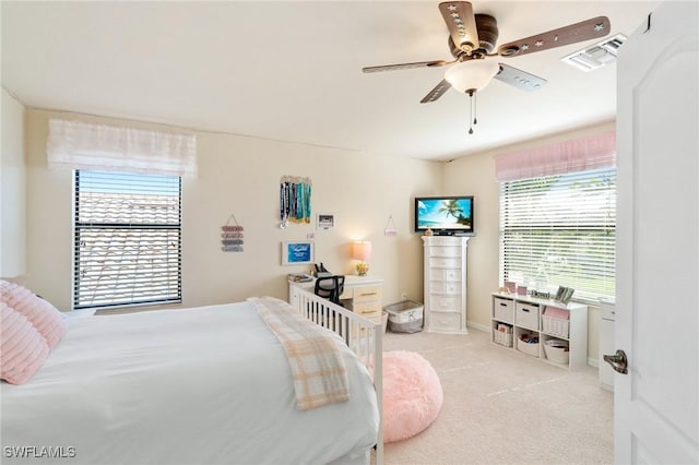 13570 San Georgio Dr, Estero, FL 33928 - bedroom featuring a ceiling fan, carpet, and visible vents