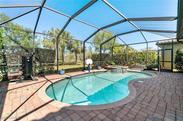 13570 San Georgio Dr, Estero, FL 33928 - view of pool with a patio, a pool with connected hot tub, and a lanai