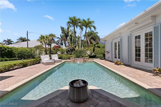 505 Harbour Dr, Naples, FL 34103 - view of swimming pool featuring a patio, french doors, and a fenced in pool