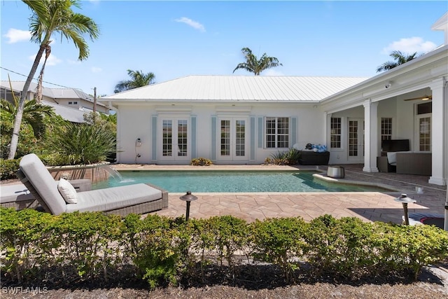 505 Harbour Dr, Naples, FL 34103 - outdoor pool with a patio and french doors