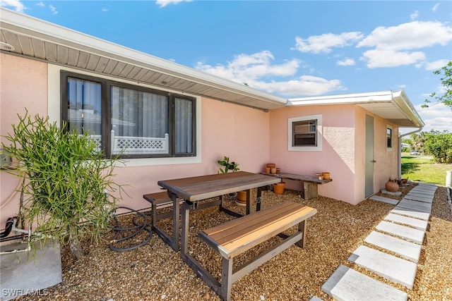 6024 Perthshire Ln, Fort Myers, FL 33908 - rear view of house featuring a patio area and stucco siding