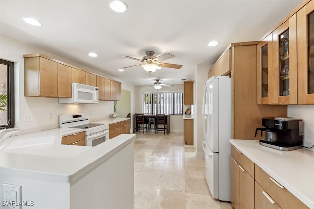6024 Perthshire Ln, Fort Myers, FL 33908 - kitchen featuring white appliances, recessed lighting, ceiling fan, a sink, and glass insert cabinets