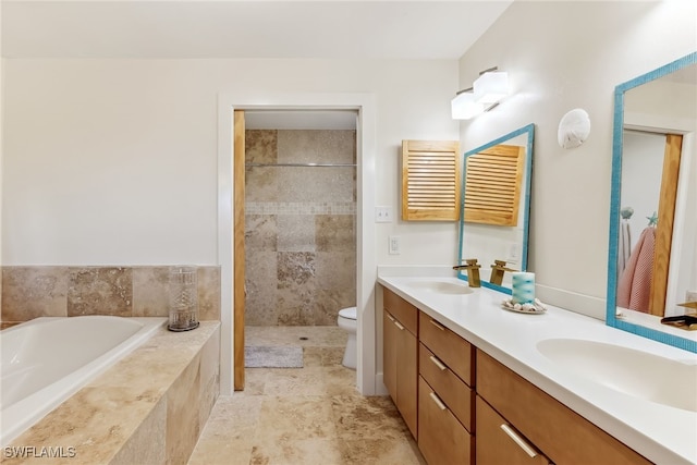 6024 Perthshire Ln, Fort Myers, FL 33908 - full bathroom with toilet, double vanity, a garden tub, and a sink