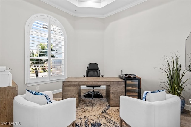 office space featuring crown molding, plenty of natural light, beverage cooler, baseboards, and a raised ceiling