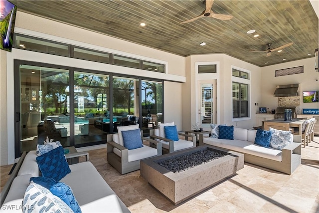 view of patio / terrace featuring an outdoor living space with a fire pit, ceiling fan, and area for grilling