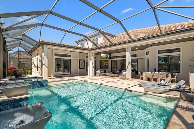 back of house featuring an outdoor living space, a ceiling fan, a tile roof, and stucco siding