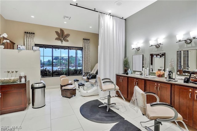 full bathroom featuring vanity, tile patterned floors, and recessed lighting