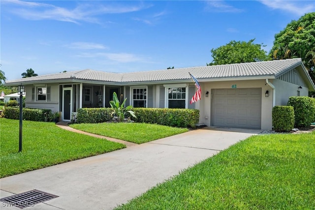 62 Lanai Cir Unit 62, Naples, FL 34112 - single story home with a tiled roof, an attached garage, and a front yard