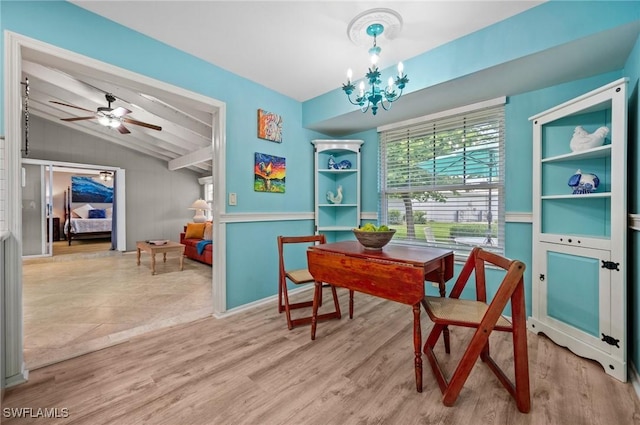 62 Lanai Cir Unit 62, Naples, FL 34112 - home office featuring lofted ceiling, wood finished floors, a ceiling fan, and a chandelier