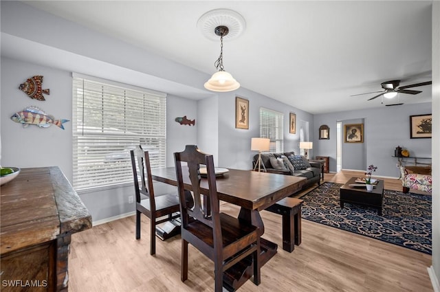 62 Lanai Cir Unit 62, Naples, FL 34112 - dining area featuring light wood-style floors and a ceiling fan
