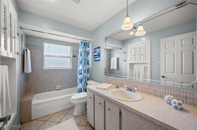 62 Lanai Cir Unit 62, Naples, FL 34112 - bathroom featuring vanity, tile patterned floors, shower / tub combo, and decorative backsplash