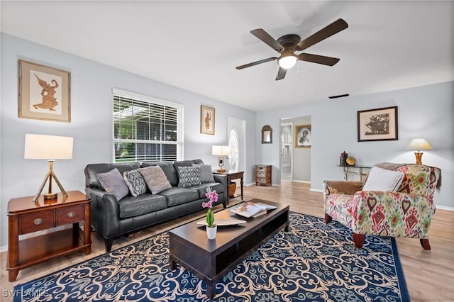 62 Lanai Cir Unit 62, Naples, FL 34112 - living room featuring ceiling fan and wood finished floors