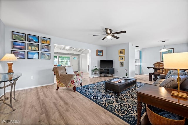 62 Lanai Cir Unit 62, Naples, FL 34112 - living area featuring ceiling fan and wood finished floors