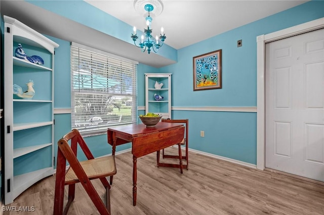 62 Lanai Cir Unit 62, Naples, FL 34112 - office area with wood finished floors and a chandelier