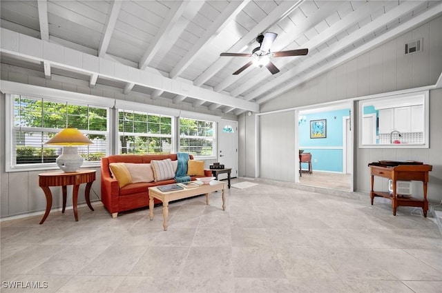 62 Lanai Cir Unit 62, Naples, FL 34112 - living room featuring a ceiling fan and wooden walls