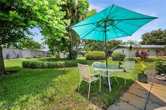62 Lanai Cir Unit 62, Naples, FL 34112 - view of grassy yard