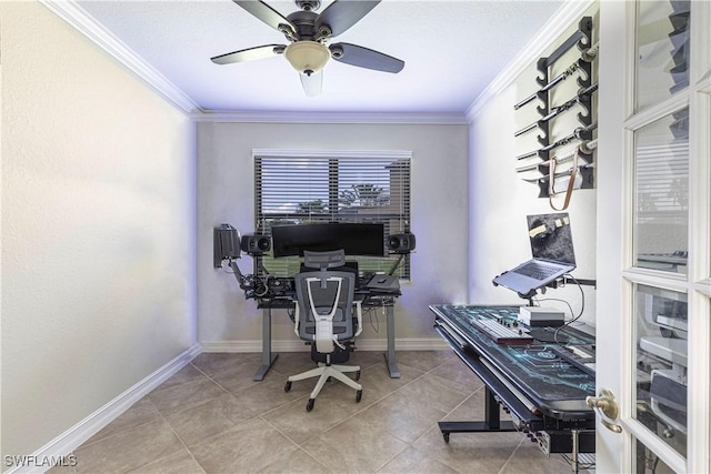 office space with baseboards, tile patterned floors, ornamental molding, and a ceiling fan