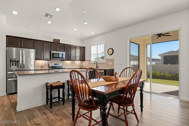 6667 Estero Bay Dr, Fort Myers, FL 33908 - dining room with visible vents, light wood-style floors, ceiling fan, and recessed lighting