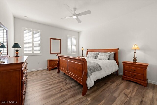6667 Estero Bay Dr, Fort Myers, FL 33908 - bedroom with baseboards, wood finished floors, and a ceiling fan