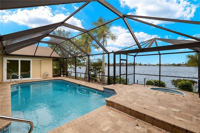 920 SW 4th Pl, Cape Coral, FL 33991 - outdoor pool with a patio area, a lanai, a hot tub, and a water view