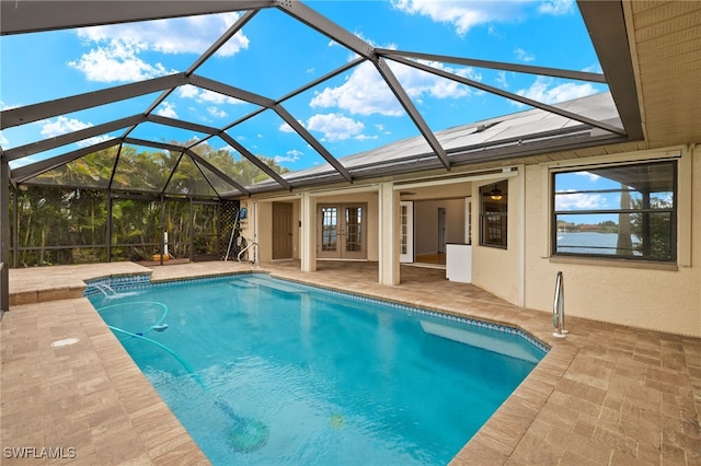 920 SW 4th Pl, Cape Coral, FL 33991 - outdoor pool with a patio area, french doors, and a lanai