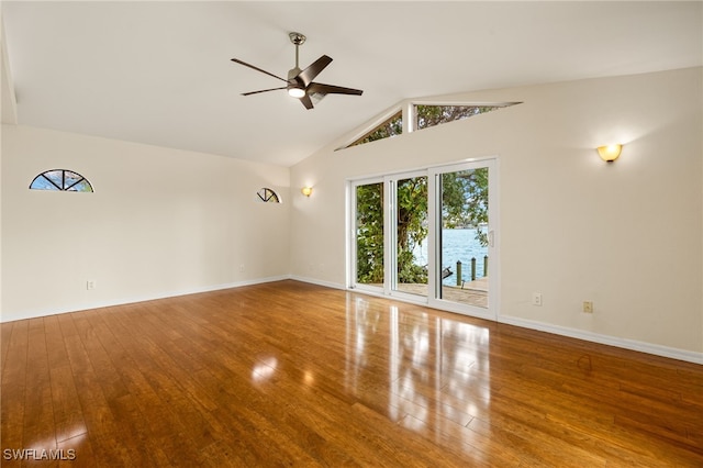 920 SW 4th Pl, Cape Coral, FL 33991 - unfurnished room featuring high vaulted ceiling, baseboards, wood-type flooring, and ceiling fan