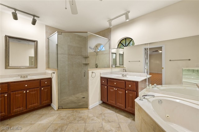 920 SW 4th Pl, Cape Coral, FL 33991 - full bathroom featuring a sink, a tub with jets, ceiling fan, and a shower stall