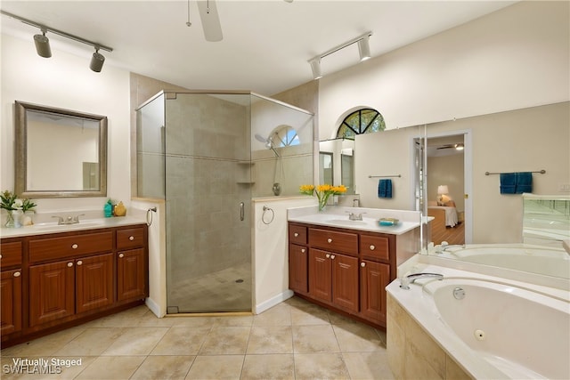920 SW 4th Pl, Cape Coral, FL 33991 - bathroom featuring two vanities, a stall shower, a sink, a tub with jets, and ceiling fan