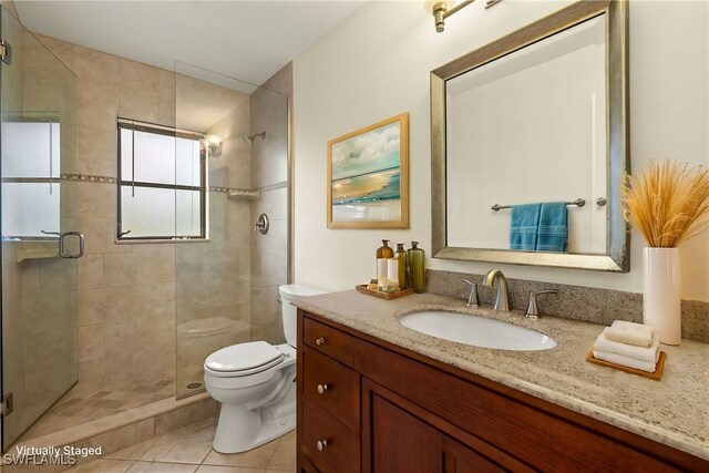 920 SW 4th Pl, Cape Coral, FL 33991 - full bath with vanity, toilet, a stall shower, and tile patterned flooring