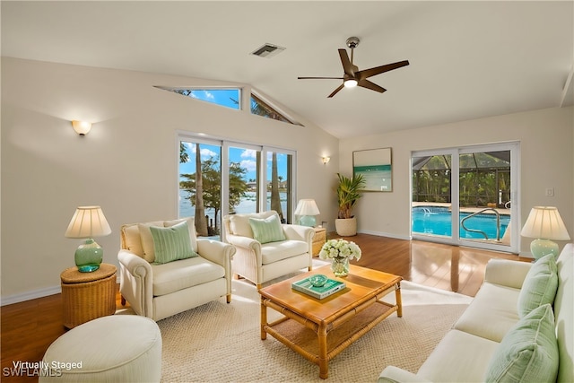 920 SW 4th Pl, Cape Coral, FL 33991 - living area featuring visible vents, wood finished floors, lofted ceiling, and ceiling fan