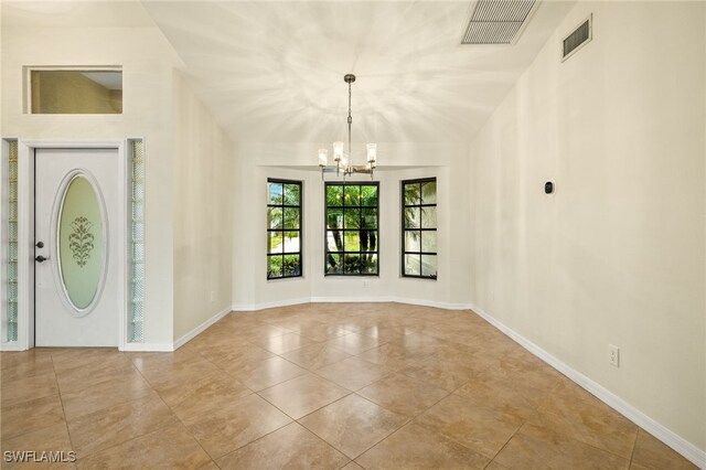 920 SW 4th Pl, Cape Coral, FL 33991 - tiled entryway featuring a notable chandelier, baseboards, and visible vents