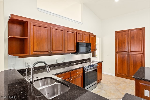 920 SW 4th Pl, Cape Coral, FL 33991 - kitchen with a sink, black microwave, dark stone counters, electric stove, and open shelves