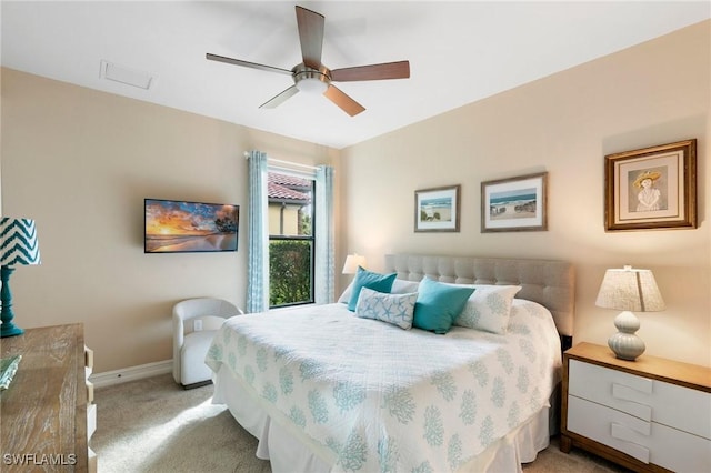 1621 Songbird Ct, Naples, FL 34120 - bedroom featuring light colored carpet, baseboards, and a ceiling fan