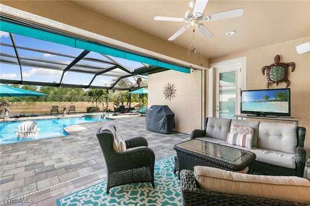 1621 Songbird Ct, Naples, FL 34120 - view of patio with an outdoor hangout area, a grill, ceiling fan, an outdoor pool, and glass enclosure