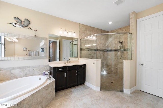 1621 Songbird Ct, Naples, FL 34120 - bathroom with a garden tub, a stall shower, and vanity