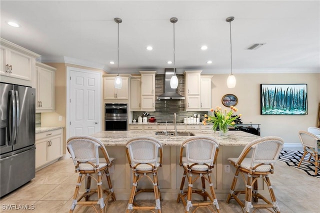 1621 Songbird Ct, Naples, FL 34120 - kitchen with stainless steel appliances, wall chimney range hood, a sink, tasteful backsplash, and crown molding