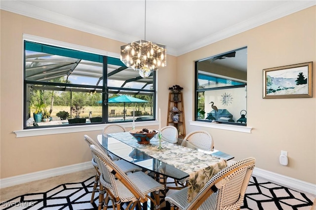 1621 Songbird Ct, Naples, FL 34120 - dining area with plenty of natural light, baseboards, crown molding, and a chandelier