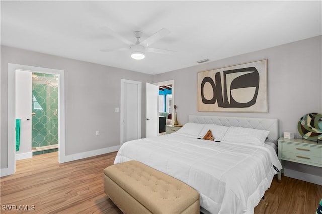 360 Bayland Rd, Fort Myers Beach, FL 33931 - bedroom featuring light wood finished floors, baseboards, and ceiling fan