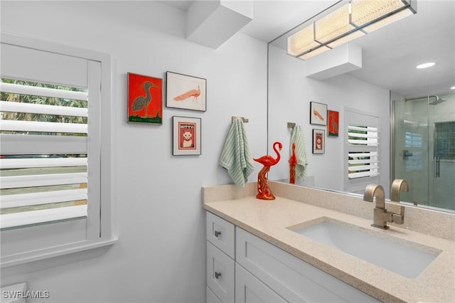 360 Bayland Rd, Fort Myers Beach, FL 33931 - bathroom featuring vanity, a stall shower, and recessed lighting