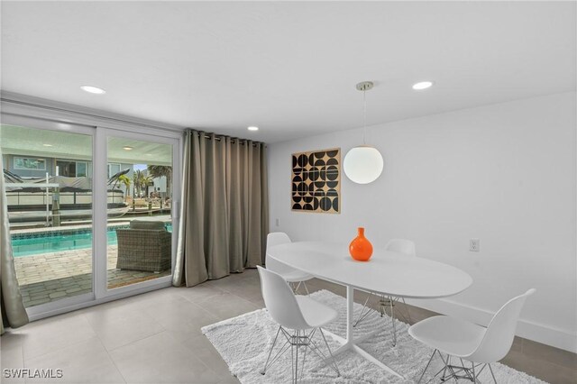 360 Bayland Rd, Fort Myers Beach, FL 33931 - dining room with light tile patterned flooring, baseboards, and recessed lighting