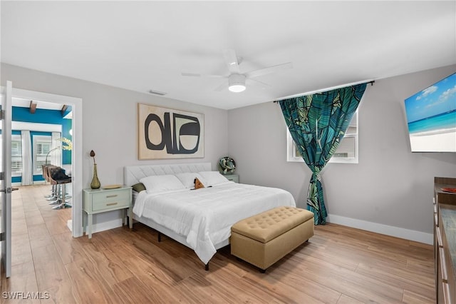 360 Bayland Rd, Fort Myers Beach, FL 33931 - bedroom with a ceiling fan, light wood-style flooring, baseboards, and visible vents